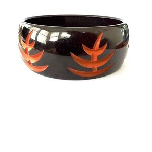 Vintage Carved Orange and Black Bakelite Bangle Bracelet